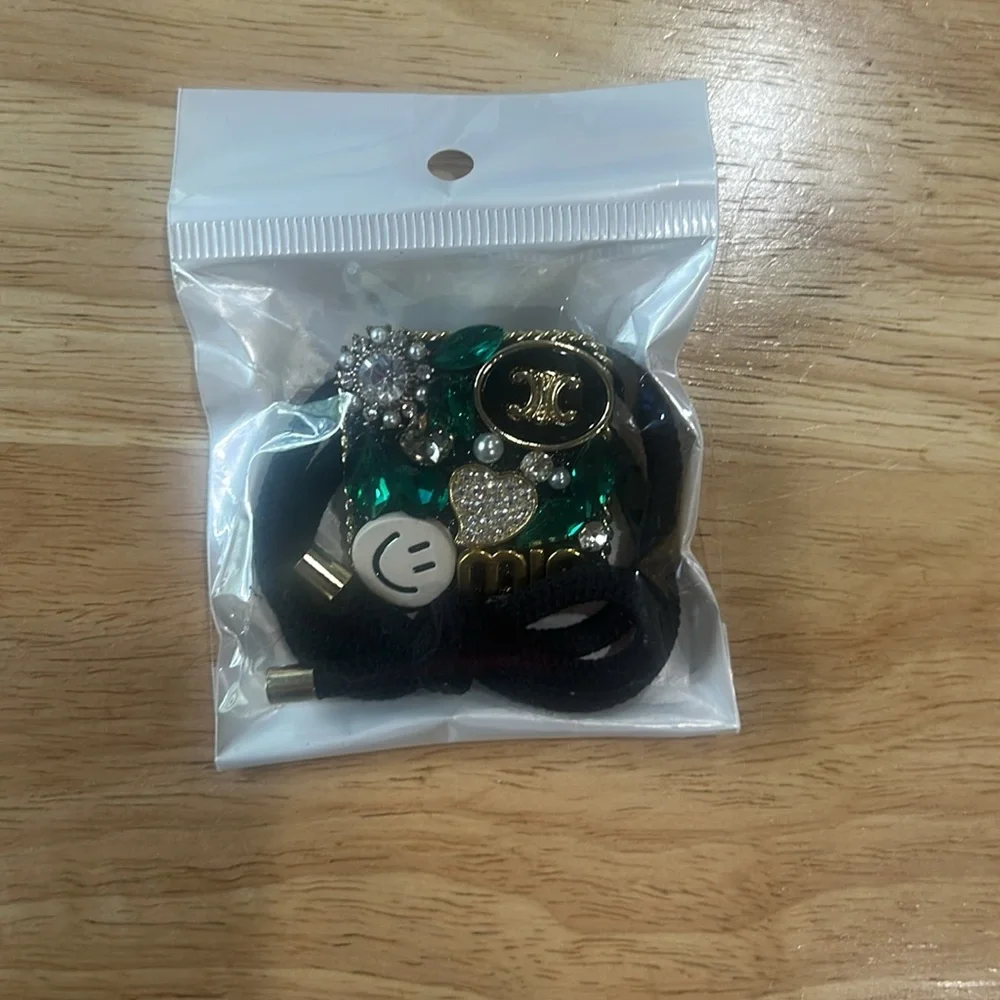 Assorted Hair Accessories with Gold and Green Accents